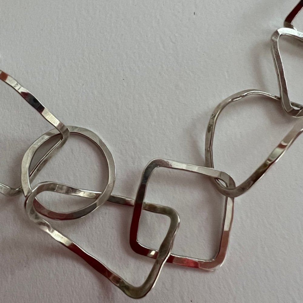 Sterling Silver hammered loop necklace 32"